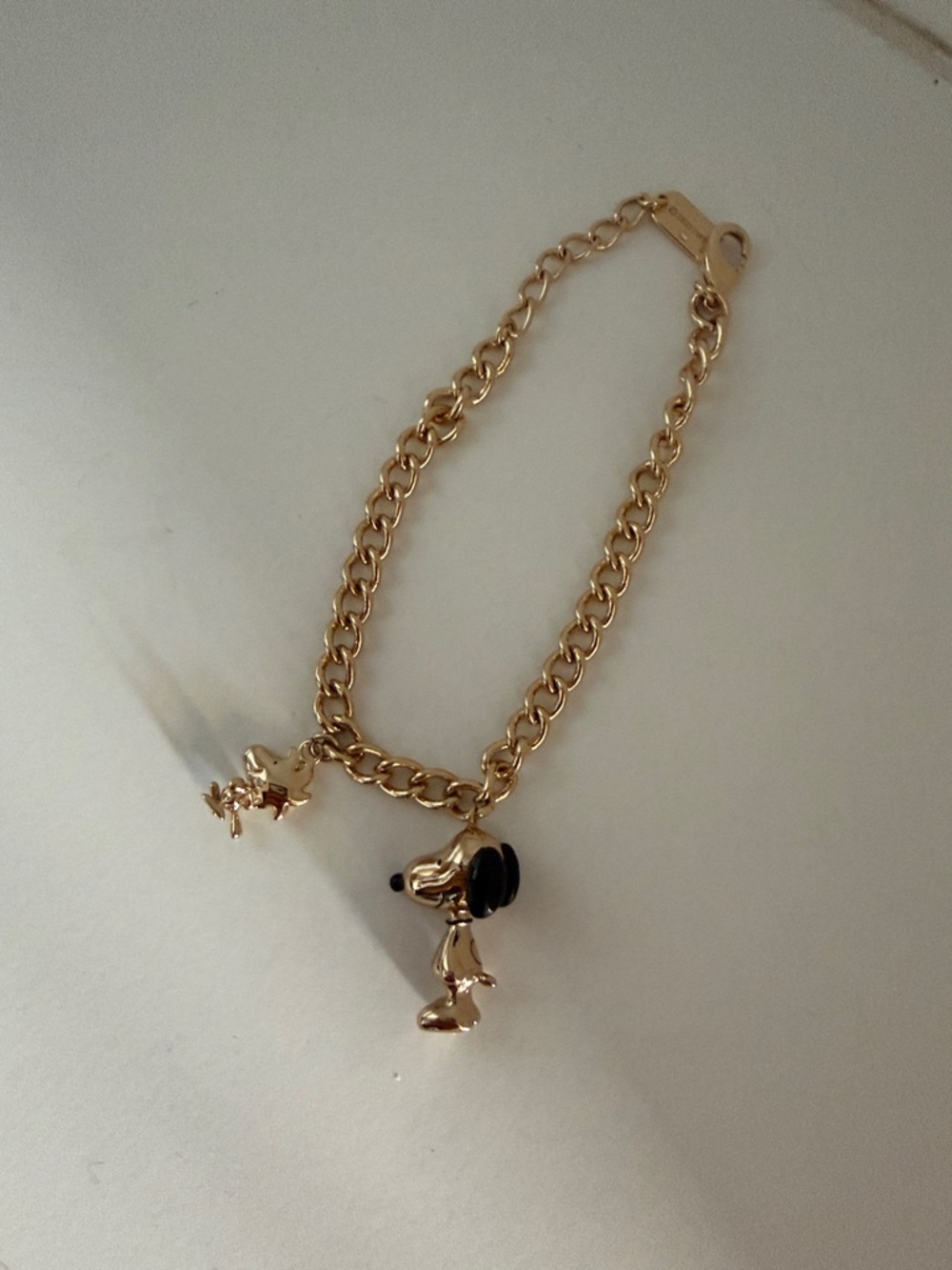 Coach Snoopy and Woodstock Gold Tone Charm Bracelet with Black Accents